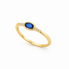 Anillo Luma con circonita ovalada azul profundo en baño en oro de 18kt