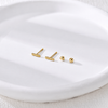 Pendientes Barra Twist baño en oro de 18kt