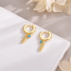 Pendientes Pluma Free turquesa baño en oro de 18kt