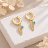 Pendientes Pluma Free turquesa baño en oro de 18kt